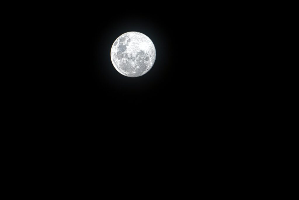 Full moon in the night sky. Could Living by the Moon Phases benefit you?